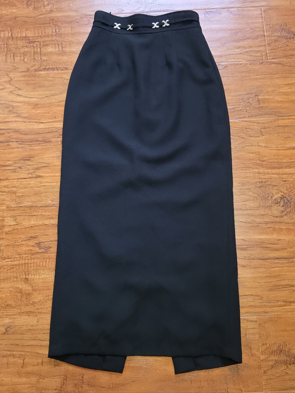 Sleek Black Midi Skirt with Decorative Waist Detail